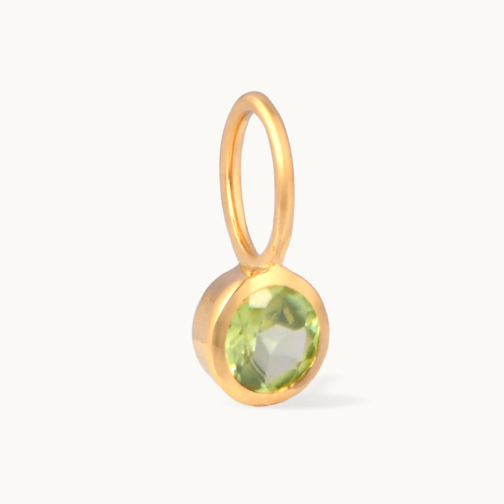 Peridotvedhæng i solfyldt guld