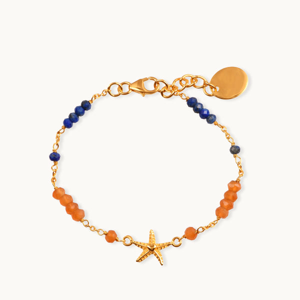 Armbånd med lapis, onyx og gyldne søstjerner